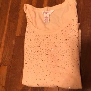 Candie’s pink studded scoop neck sweater.
